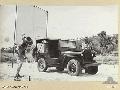 1943. 05. 05. NEW GUINEA, ERECTING A COLLAPSIBLE SCREEN FOR TALKIES, SOMEWHERE IN NEW GUINEA.