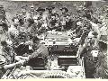 1943. 10. 01. NEW GUINEA. ATTACK ON KAIAPIT. AT KAIAPIT AUSTRALIAN SOLDIERS PUT A JEEP IN A NEW USE. HERE A JEEP IS BEING USED AS A MESS TABLE