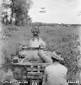 BEAUFORT AREA, BORNEO. 6 JULY 1945. A JEEP TRAIN CARRYING HEADQUARTERS 24TH INFANTRY BATTALION EQUIPMENT AND SUPPLIES, ON THE BEAUFORT-JESSELTON RAILWAY LINE.