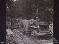 BEAUFORT, BORNEO. 1 JULY 1945. MEMBERS OF 2_16 FIELD COMPANY, ROYAL AUSTRALIAN ENGINEERS, TRAVELLING ON A JEEP WHICH THEY CONVERTED FOR USE ON THE RAILWAY