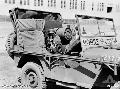 BRISBANE_QLD_1943-09_A JEEP OF THE 85TH MOBILE CINEMA UNIT_AUSTRALIAN ARMY AMENITIES SERVICE AT ADVANCED LAND HEADQUARTERS WHICH IS LOCATED AT THE UNIVERSITY OF BRISBANE ST. LUCIA