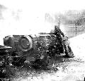 Hq 863d FA Bn Jeep hit by enemy fire Germany, 1945.
