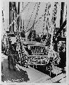 New River area, North Carolina. Jeep being lowered from a transport ship to Higgins boat during a First Division landing operation 1941 Aug.. Bantam BRC 40.