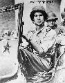 John Hersey, writer driving Jeep.