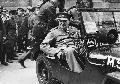 Prime Minister Winston Churchill sitting in Jeep. July 16, 1945