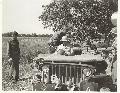 Sec. of War Stimson (in Jeep) with Gen. Clark and LC Walker standing nearby, Italy 1944