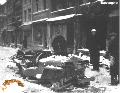 Direct hit on street, Bastogne. 6th Armored Division.