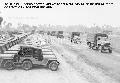 2nd June 1945: American Army trucks leaving the motor pool to join the first convoy to travel over..