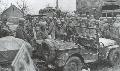 20234134-S Willys MB, American Infantrymen of the 11th Infantry regiment, 5th Infantry Division, U.S. Third Army, prepare to board trucks which carry them to the  Rhine River. 7 March 1945