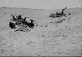 Wrecked SAS jeep in the desert.