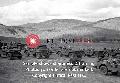 Large numbers of US Army jeeps driven on a field in United States. 1942