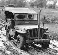 DOTTIE on muddy French road