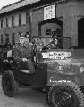 20709373 MB On an inspection tour of the Replacement Training Center at Camp Drake, north-west of Tokyo, Japan, 15th May 1951. In the rear of the jeep is RTC commander, Colonel Merl L. Broderick.