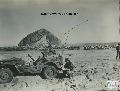 20103146-S Willys MB US soldier taking down message in Morro Bay, California on 27 March 1944