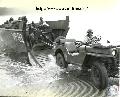 20193409-S Ford GPW Jeep exiting an LCVP during amphibious training maneuvers in Morro Bay, California on 20 January 1944