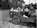 George Washington School No55 in Indianapolis. Some of the boys are dressed in military uniforms. 14 May 1943 (Indiana Historical Society)