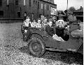 George Washington School No55 in Indianapolis. Some of the boys are dressed in military uniforms. 14 May 1943 (Indiana Historical Society)