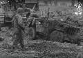 Jeep was buried but it pulled out. France, 1944