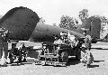 2032736 MB Magnetic jeep picking up nails and wires from camp roads, the designer, Senior Sergeant W. Paul Cail at the Wheel demonstrating to Australian Army staff. 
